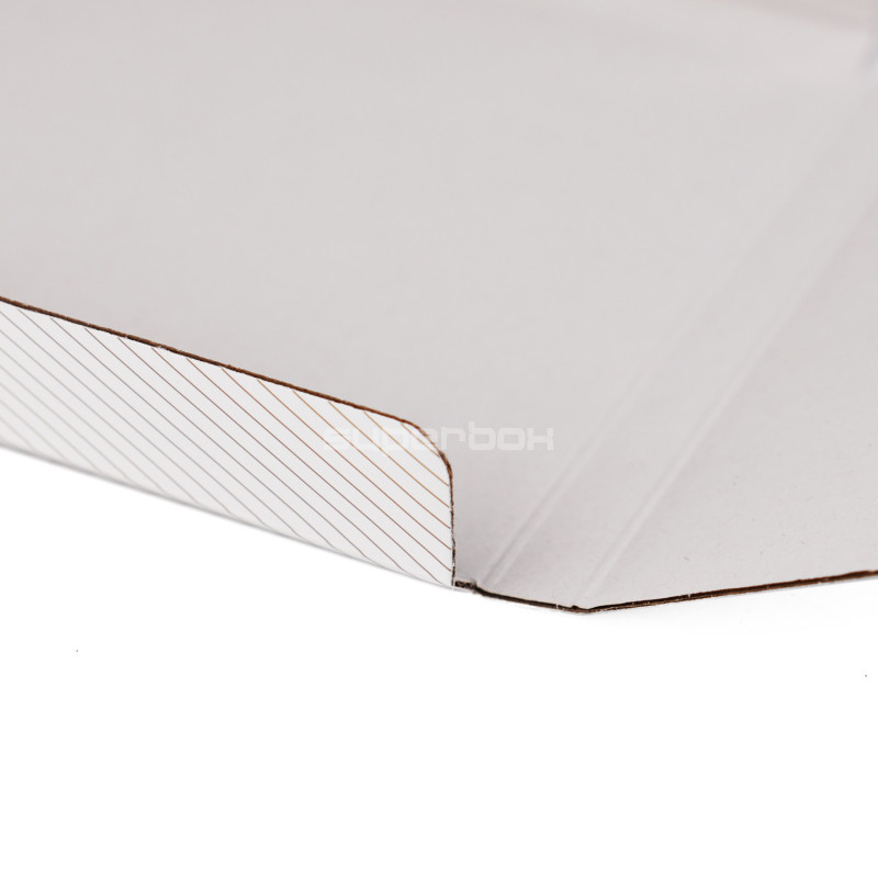 Small White Envelope with Gold Lines Tied With a Ribbon
