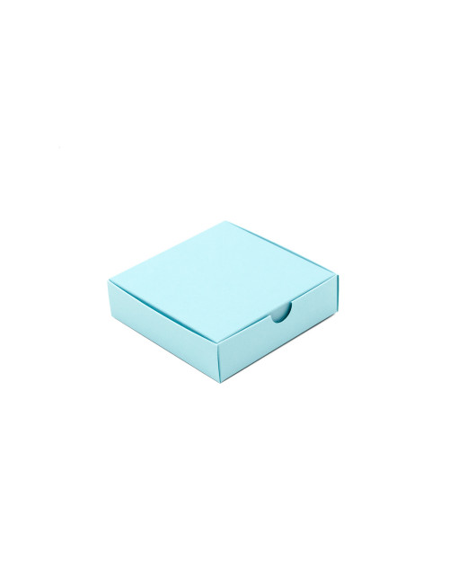 Neliela kvadrātveida dāvanu kaste no zīdaini zila dekoratīvā kartona