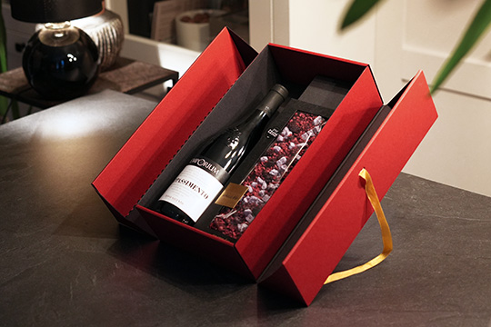 Red Double Door gift box with satin ribbon and gift inside